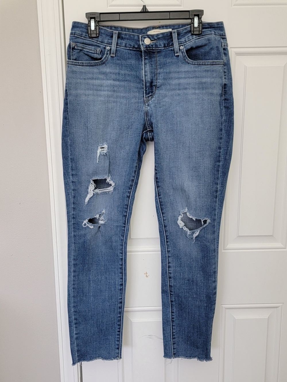 Levi’s 711 Skinny Stretch Distressed Denim Mid-Rise Raw Hem Jeans Size 31